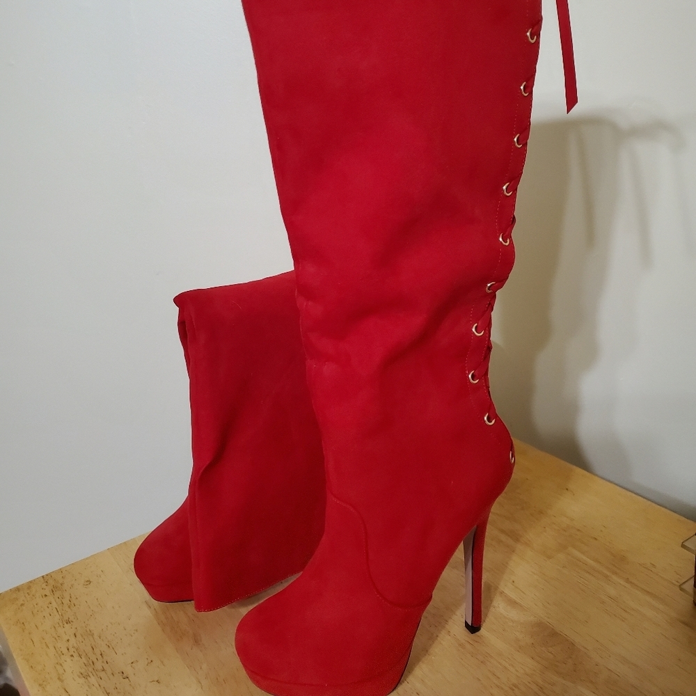 Red knee-high heels.